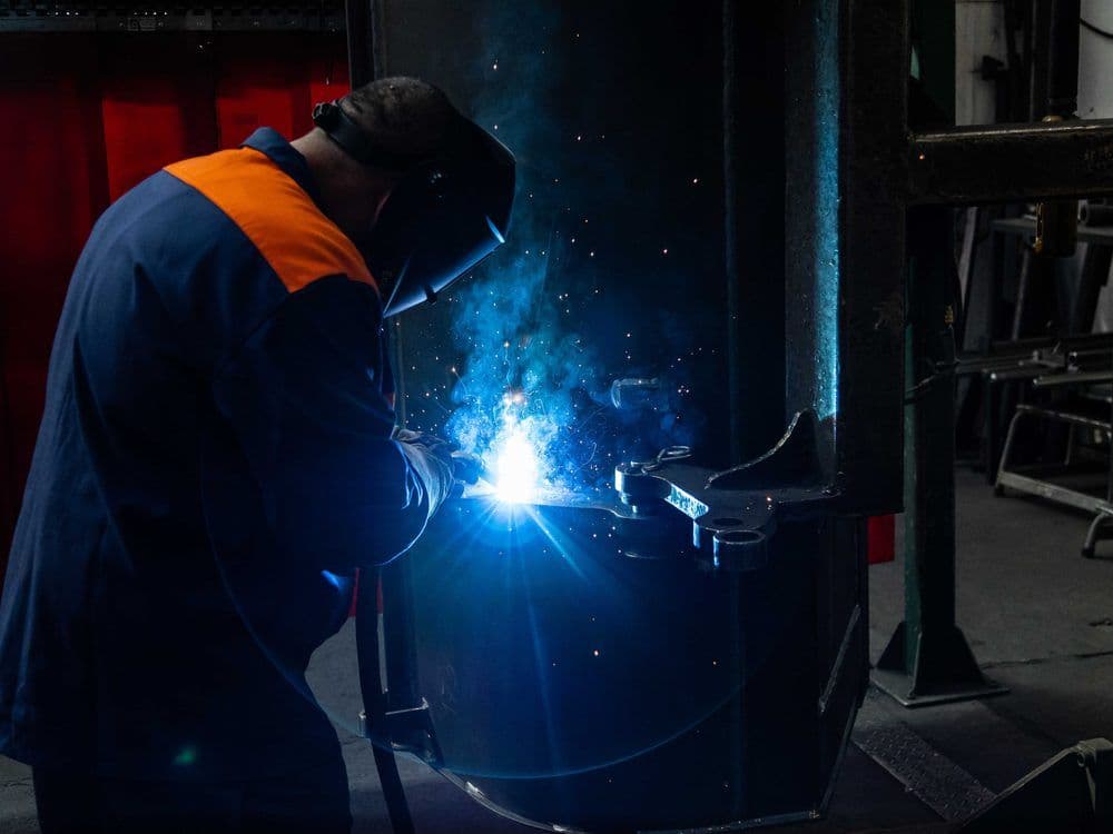 Kapos Atlas welder joining a steel component, sparks flying
