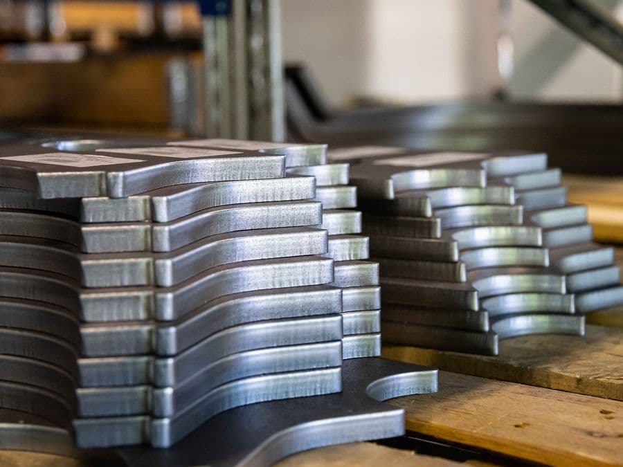 Stacks of precision-cut steel plates ready for further processing