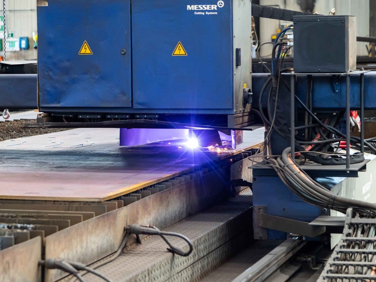 Plasma cutting of a steel plate on a CNC cutting machine