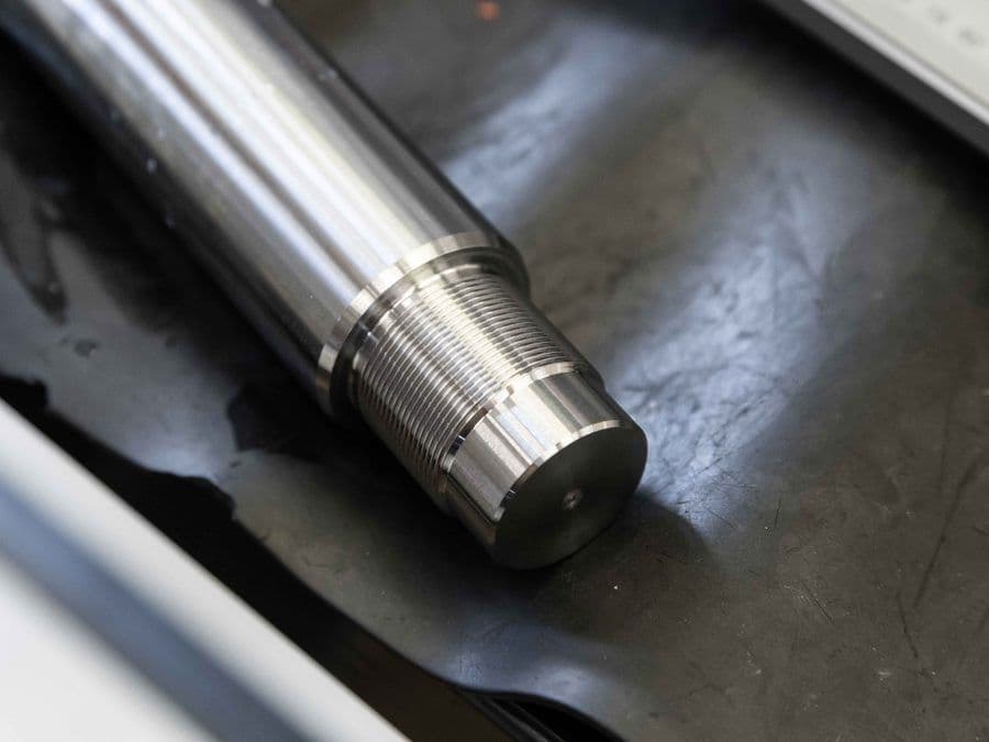 Precision-machined and threaded steel shaft