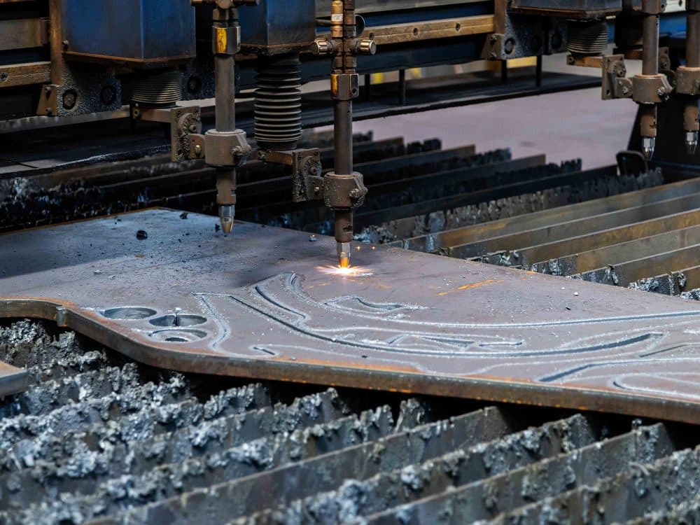 Plasma cutting of a steel plate on a CNC cutting machine