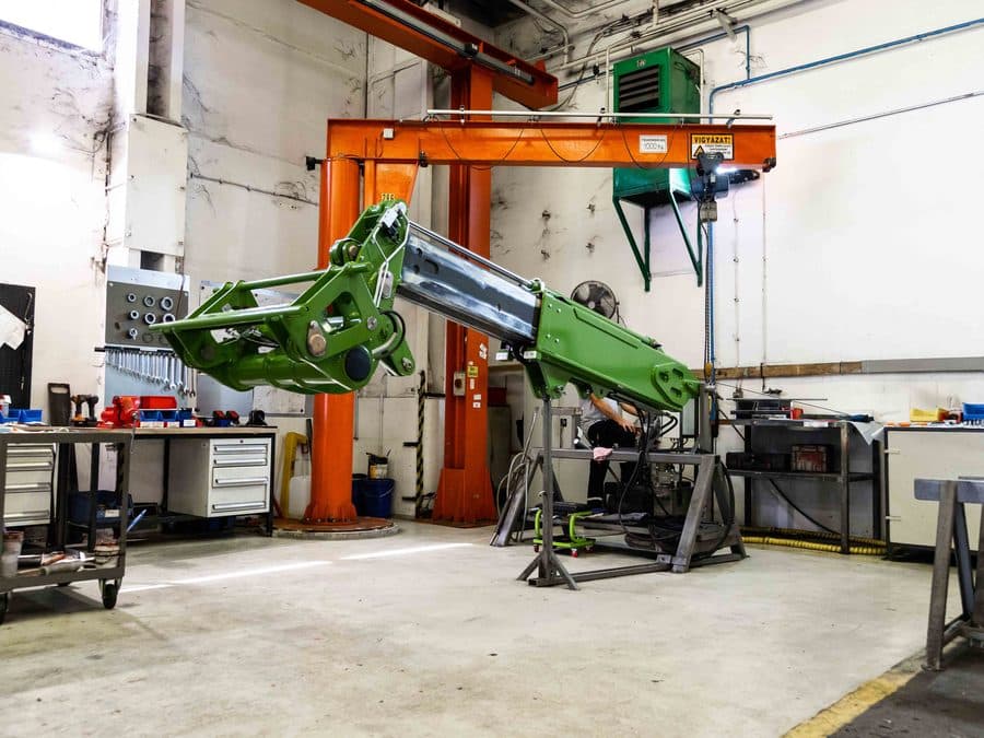 Painted wheel-loader boom during assembly at Kapos Atlas