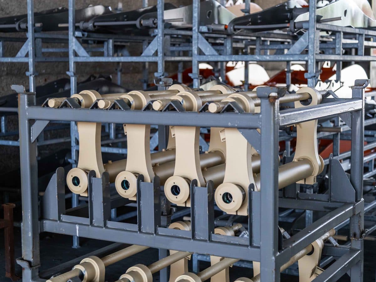 Custom-engineered Kapos Atlas attachment components ready for finishing