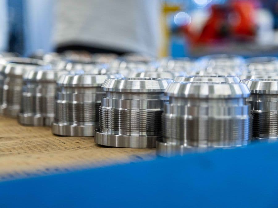 Batch of precision-turned steel bushings
